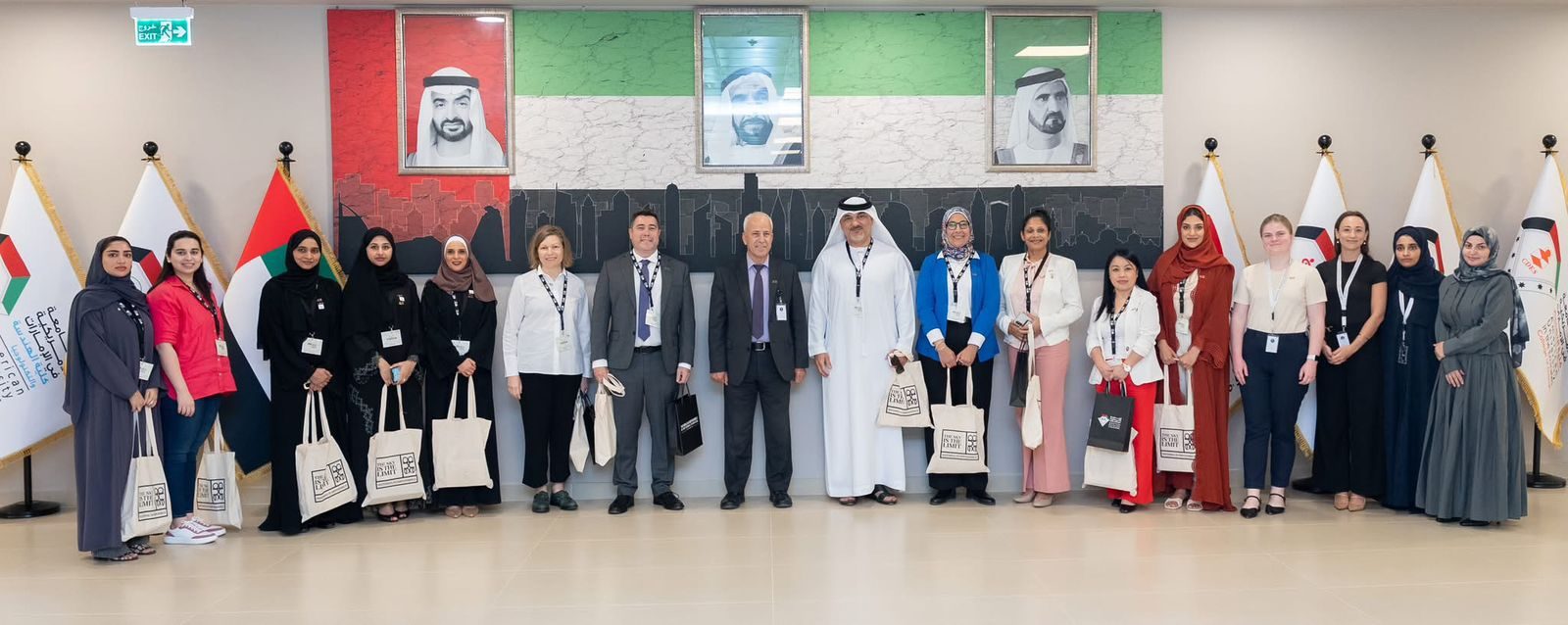 Full team group photo at AUE lobby