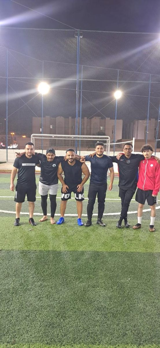 CMS Holoul team posing by the goal post