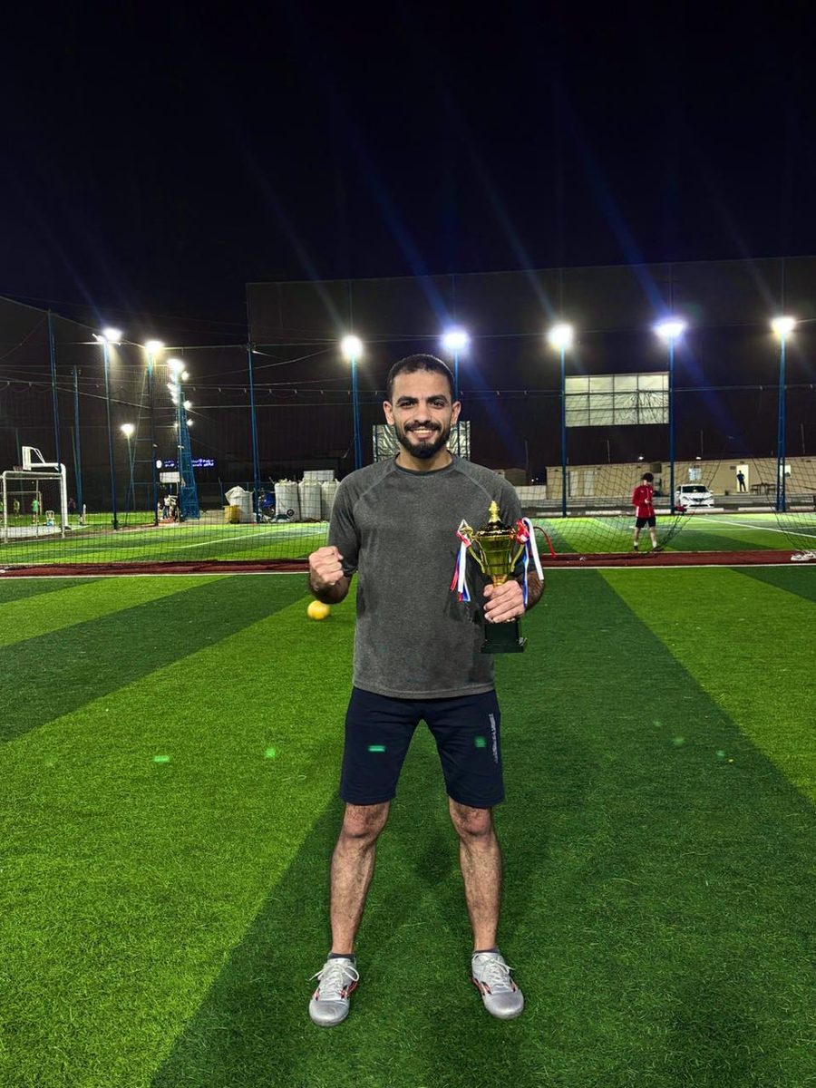 Top scorer with trophy at CMS Holoul Eid soccer tournament